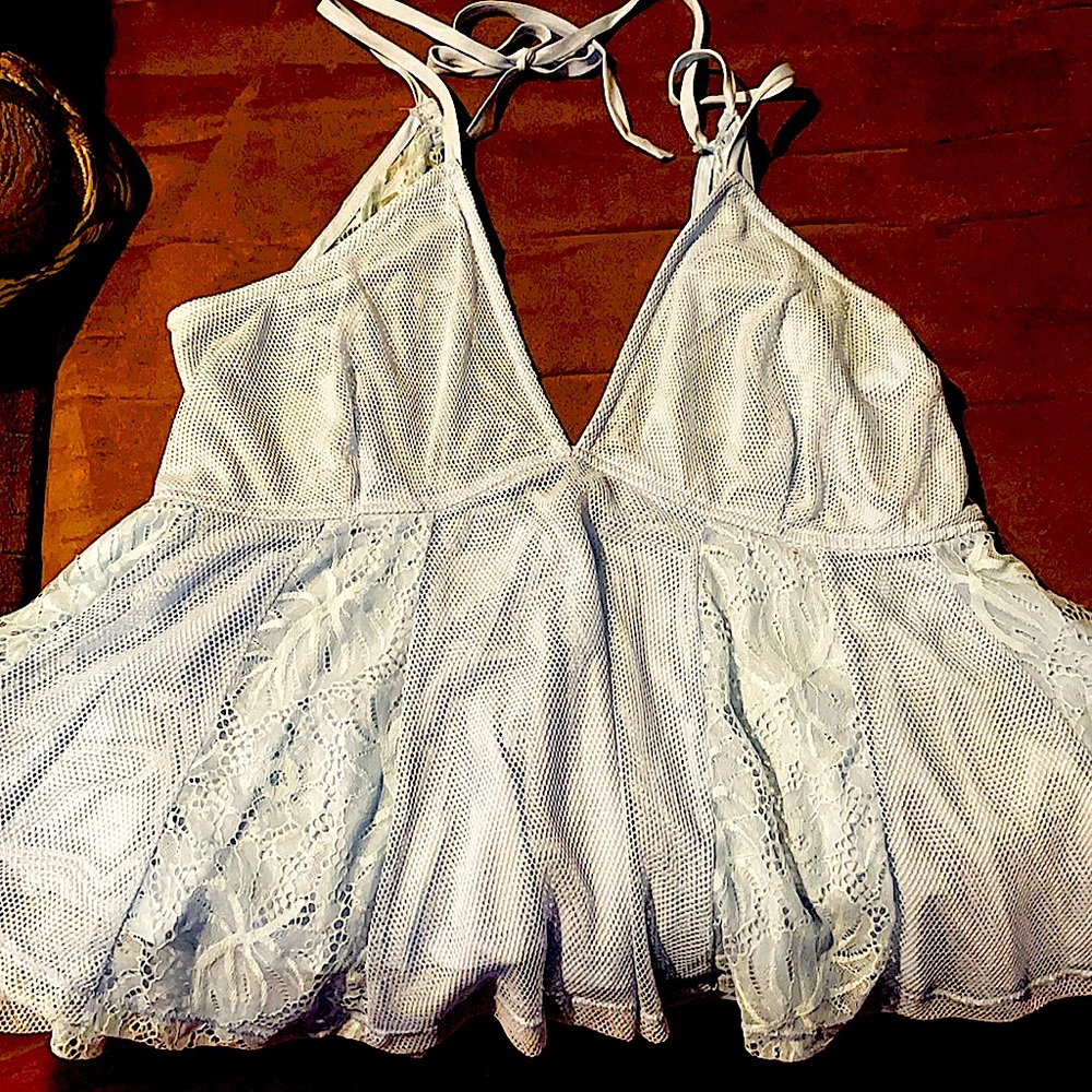 New! Baby blue camisole. Lace detail. Low cut